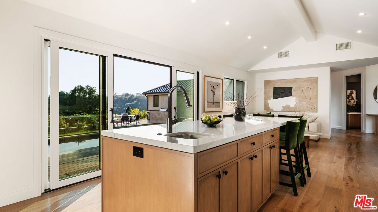 13146 Rivers Road Los Angeles, CA 90049 - Photo 12 of 42 a room with sink and view of living room