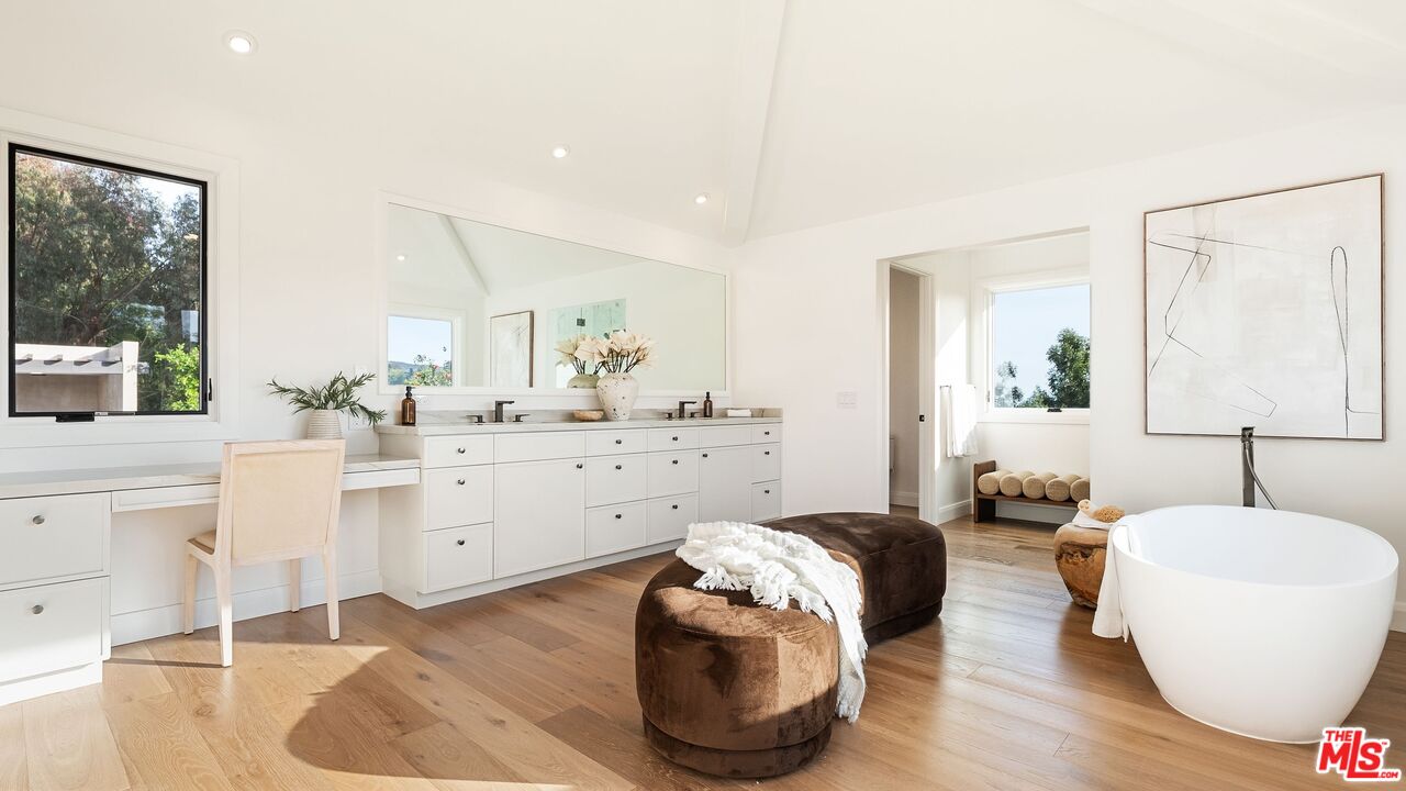 13146 Rivers Road Los Angeles, CA 90049 - Photo 20 of 42 a living room with furniture and a wooden floor