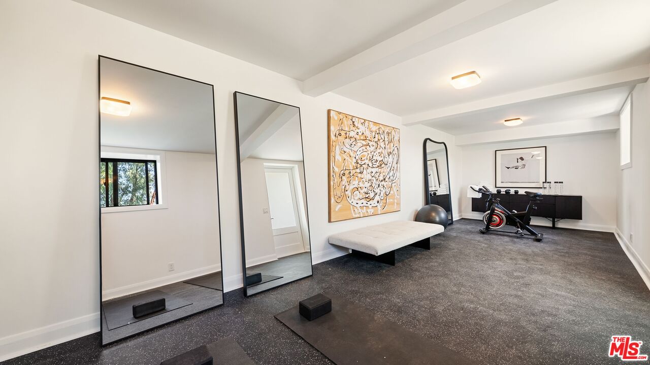 13146 Rivers Road Los Angeles, CA 90049 - Photo 34 of 42 a living room with furniture and a window