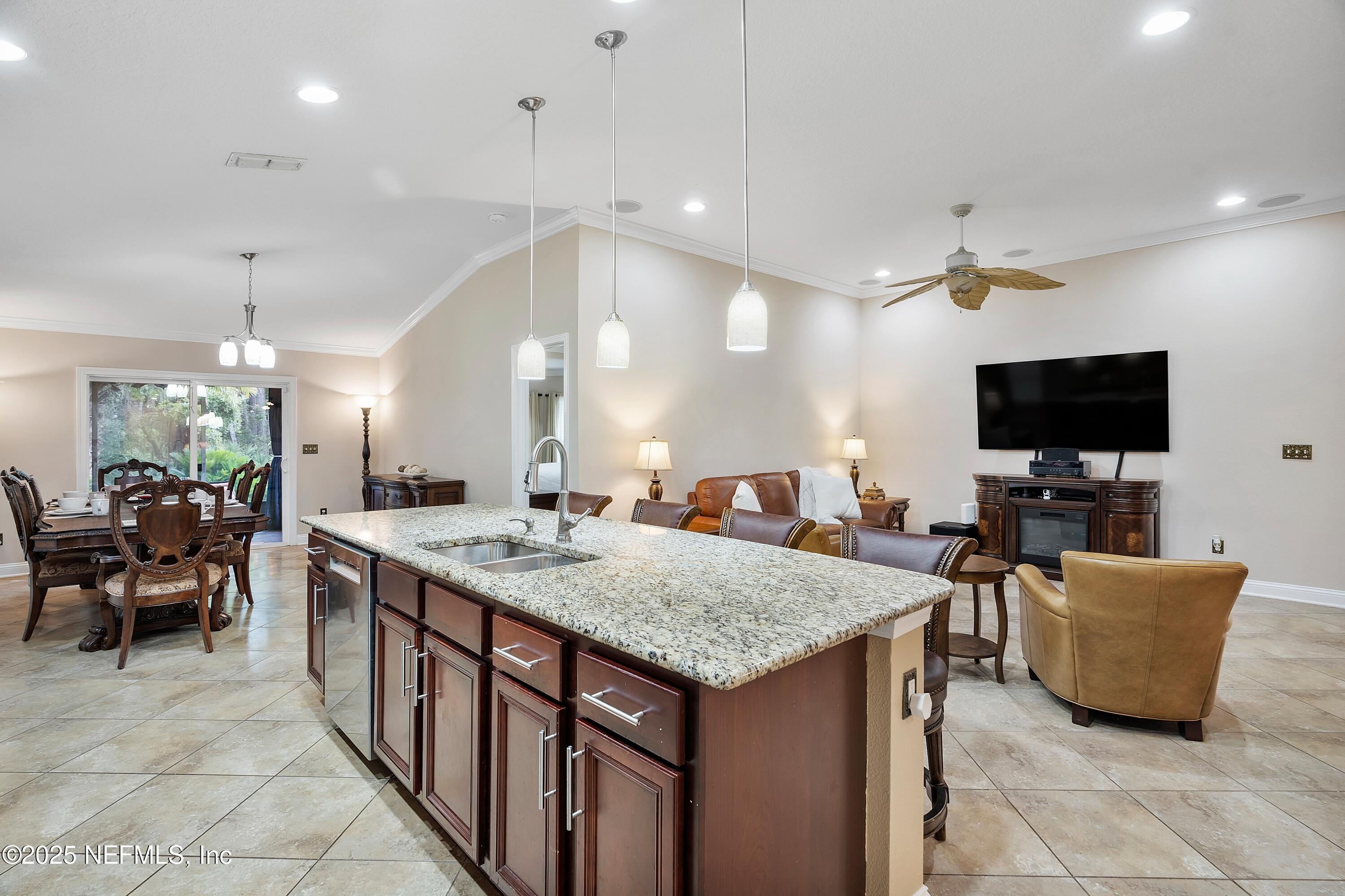 78 Wayfare Lane Jacksonville, FL 32081 - Photo 14 of 61 a open kitchen with stainless steel appliances granite countertop a stove and a center island