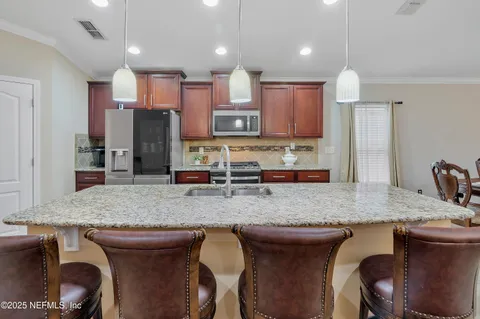 a view of a dining room with furniture