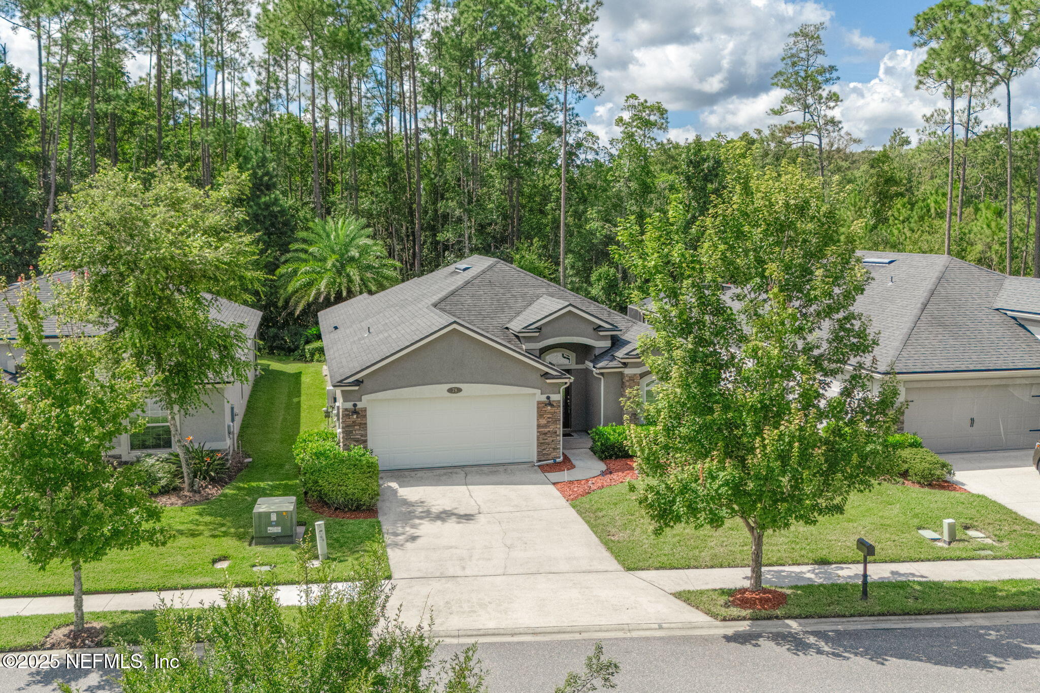 78 Wayfare Lane Jacksonville, FL 32081 - Photo 60 of 61 a front view of a house with a yard