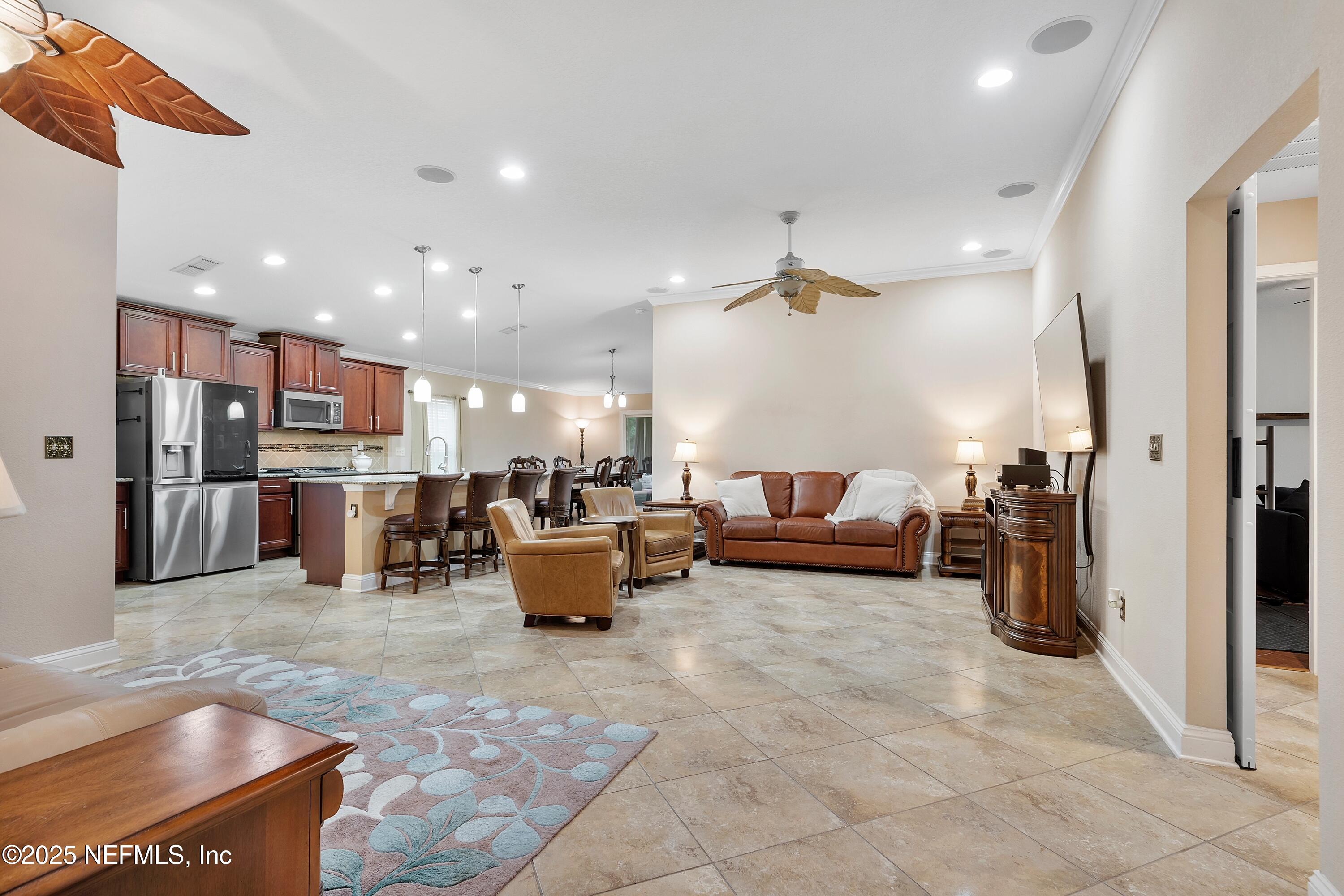 78 Wayfare Lane Jacksonville, FL 32081 - Photo 9 of 61 a living room with furniture and kitchen view