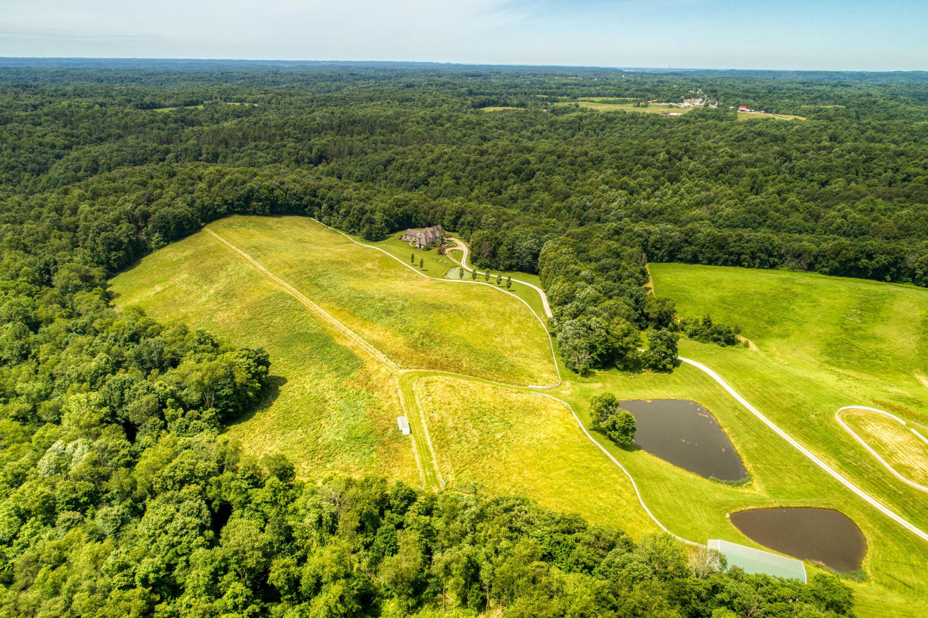 16187 Kreashbaum Road Rockbridge, OH 43149 - Photo 7 of 66 Aerial view of the fishing ponds and hilltop acreage.