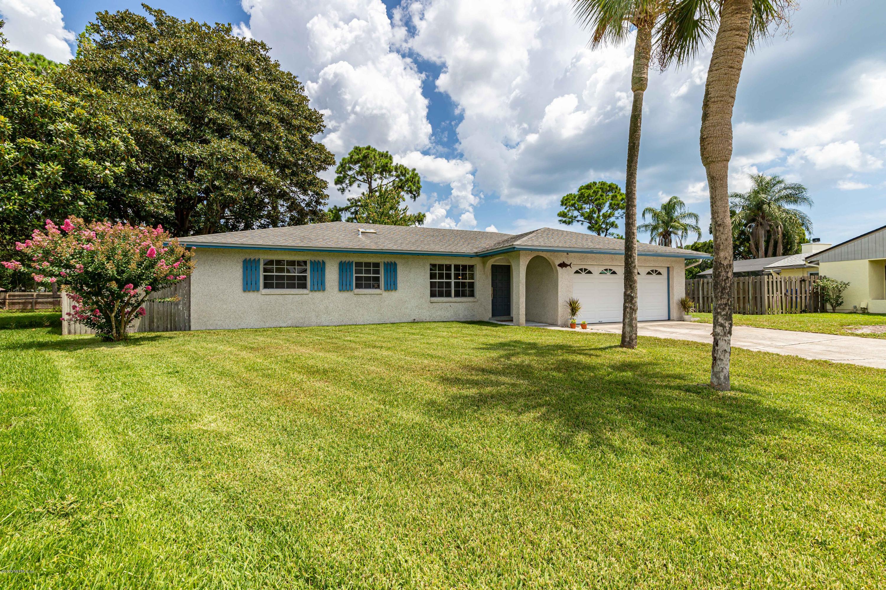 20 Amberjack Road Ponte Vedra Beach, FL 32082 - Photo 1 of 37 a view of a house with a backyard