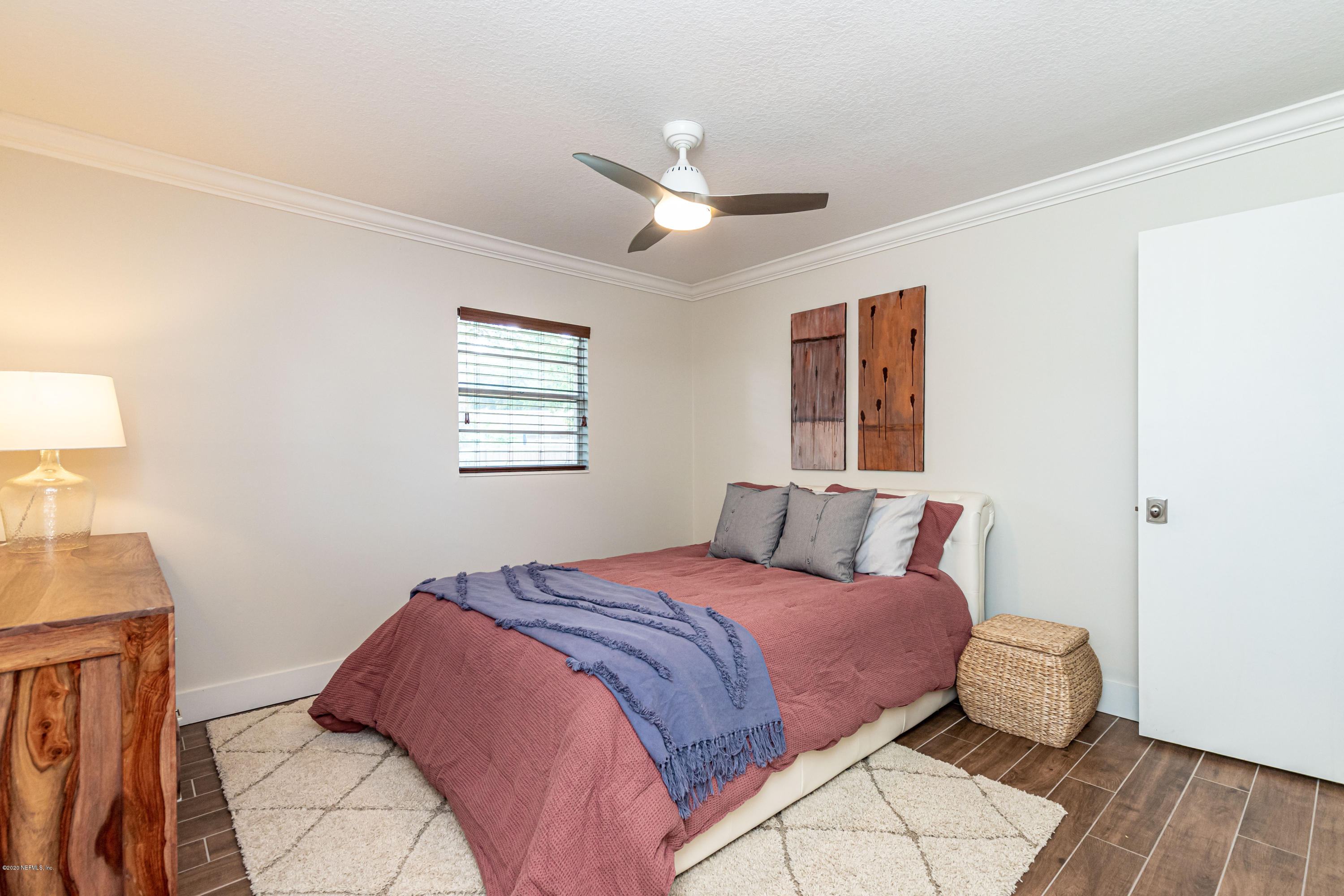 20 Amberjack Road Ponte Vedra Beach, FL 32082 - Photo 19 of 37 a bedroom with a bed and a window