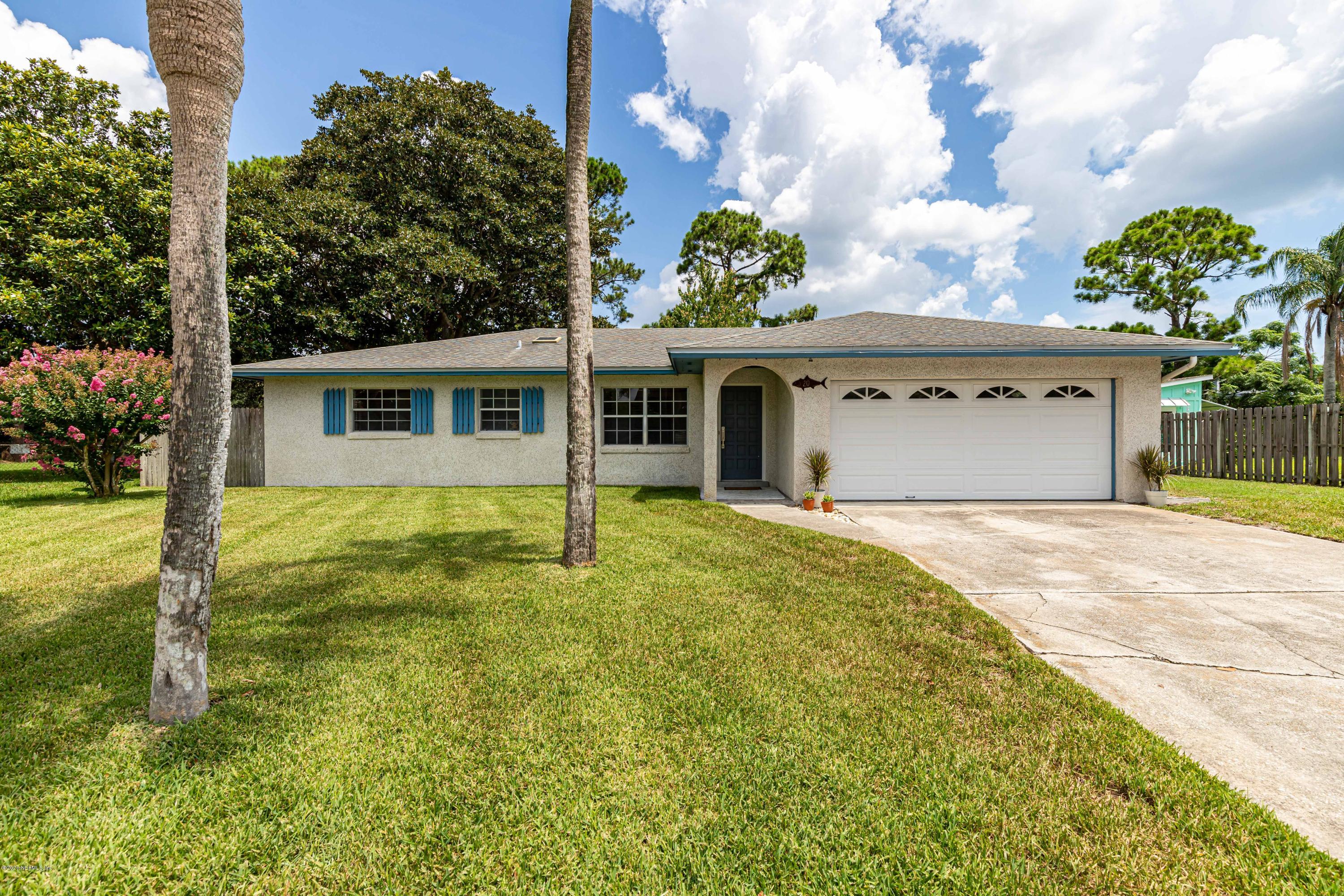 20 Amberjack Road Ponte Vedra Beach, FL 32082 - Photo 2 of 37 a front view of a house with garden