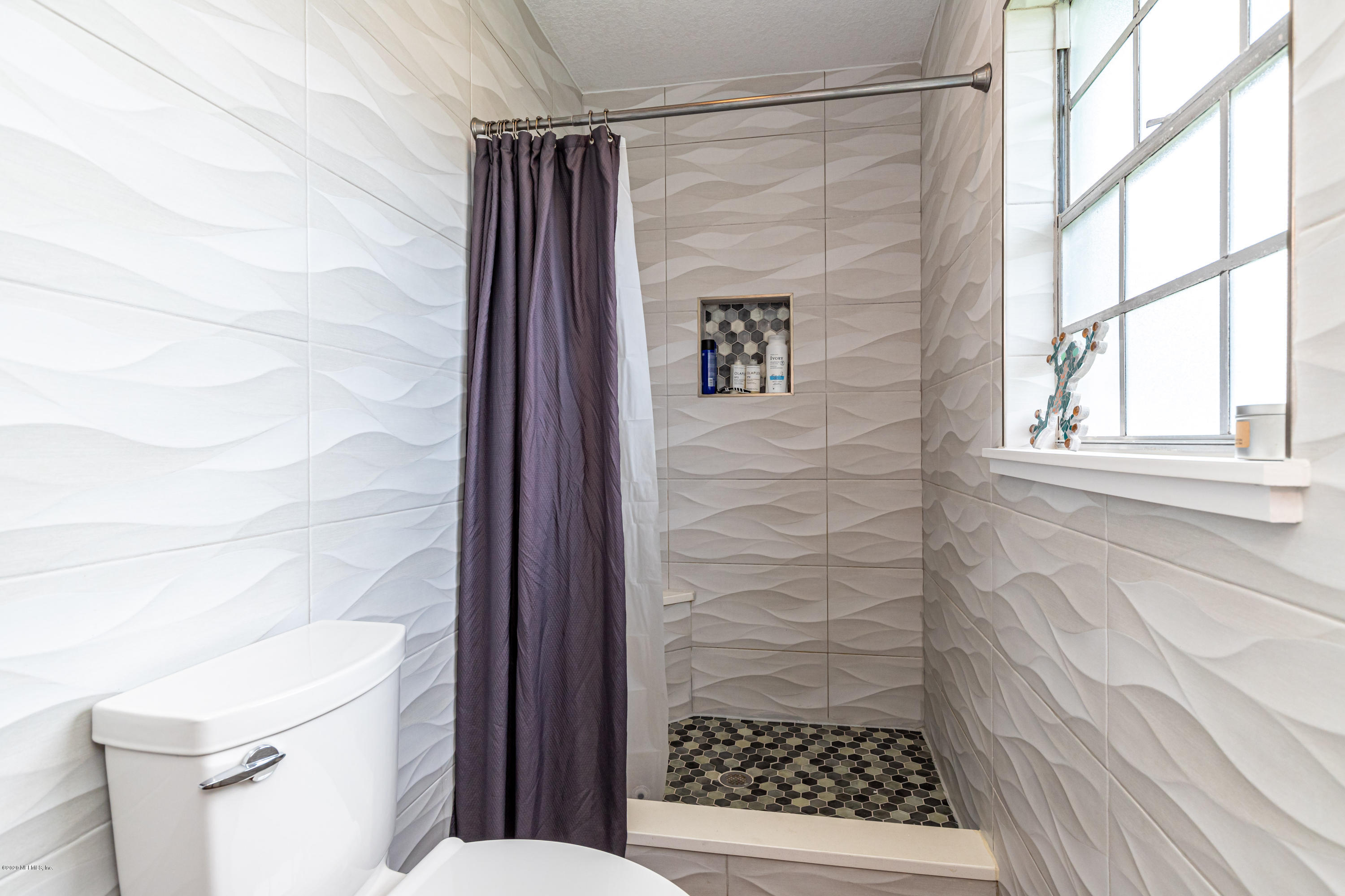 20 Amberjack Road Ponte Vedra Beach, FL 32082 - Photo 25 of 37 a bathroom with a shower and a toilet