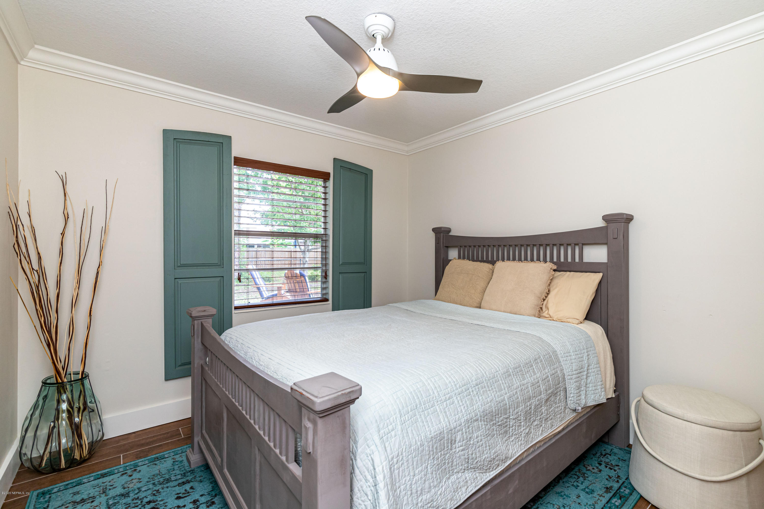 20 Amberjack Road Ponte Vedra Beach, FL 32082 - Photo 26 of 37 a bedroom with a bed and a large window