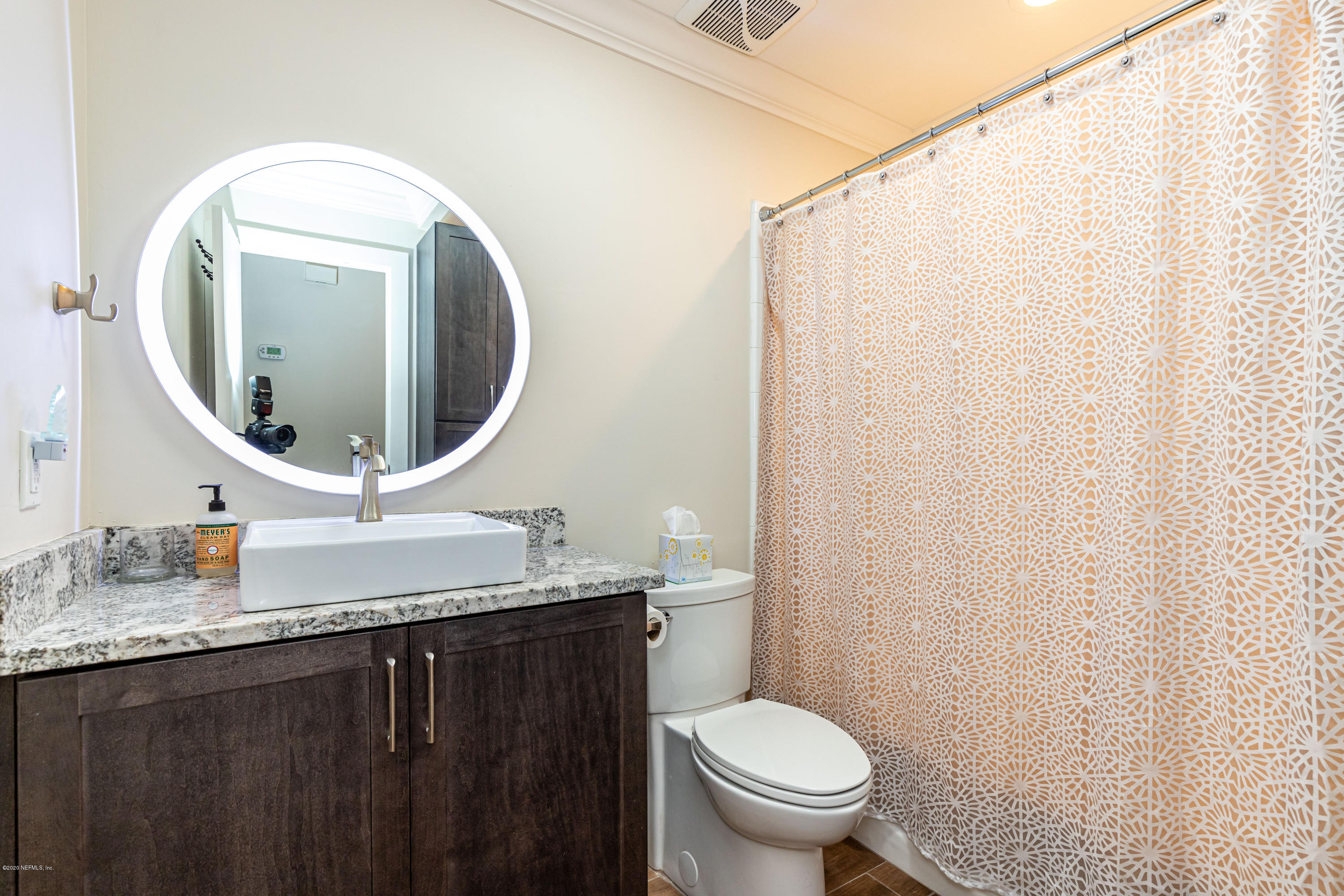 20 Amberjack Road Ponte Vedra Beach, FL 32082 - Photo 29 of 37 a bathroom with a granite countertop sink vanity mirror and toilet