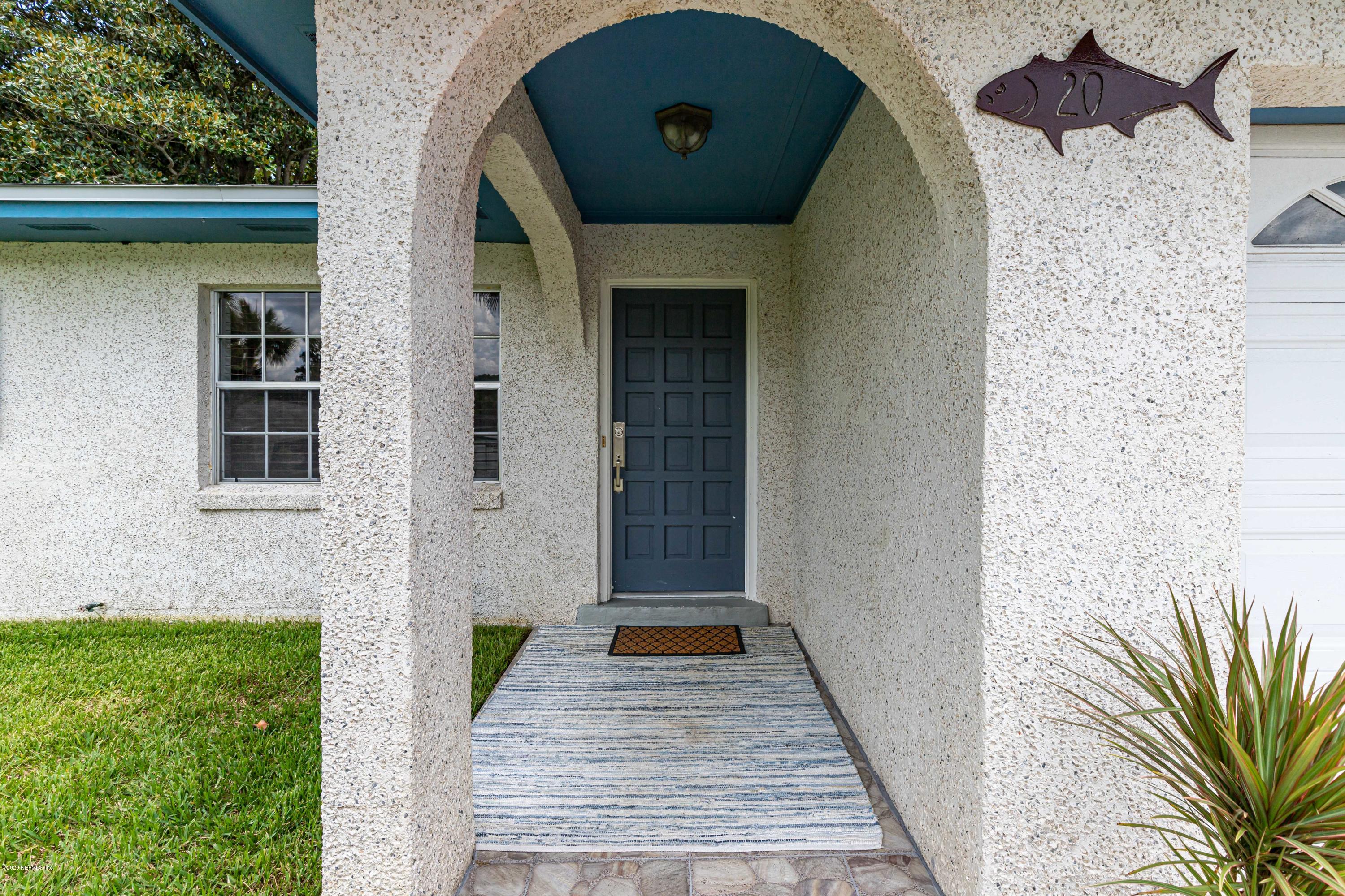 20 Amberjack Road Ponte Vedra Beach, FL 32082 - Photo 3 of 37 a front view of a house with a yard