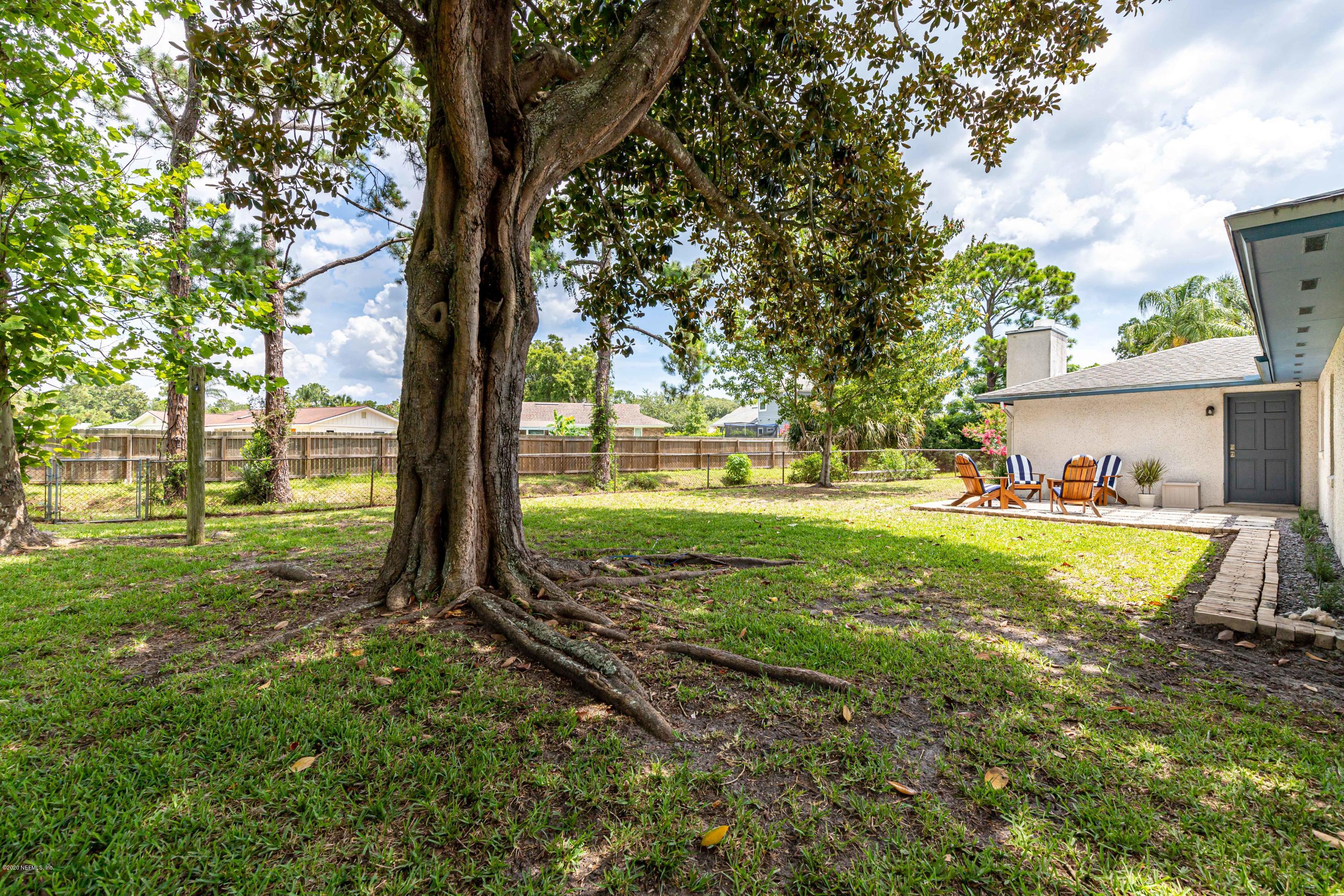 20 Amberjack Road Ponte Vedra Beach, FL 32082 - Photo 34 of 37 a view of a house with a yard