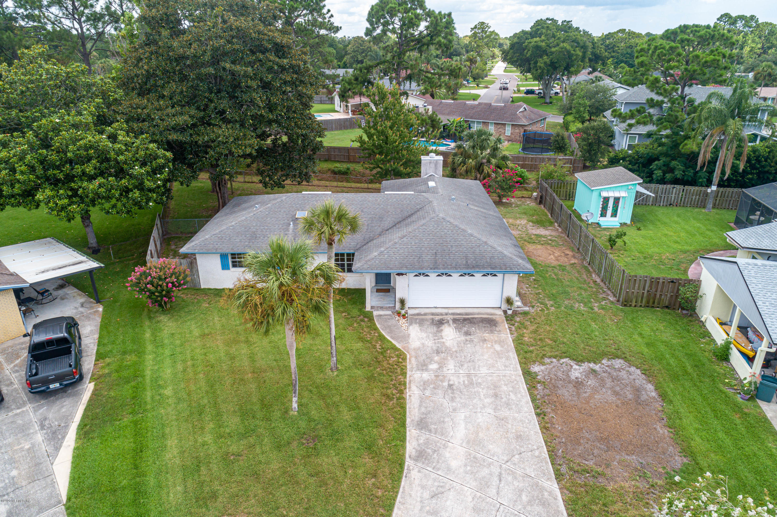 20 Amberjack Road Ponte Vedra Beach, FL 32082 - Photo 35 of 37 an aerial view of a house with yard swimming pool and outdoor seating
