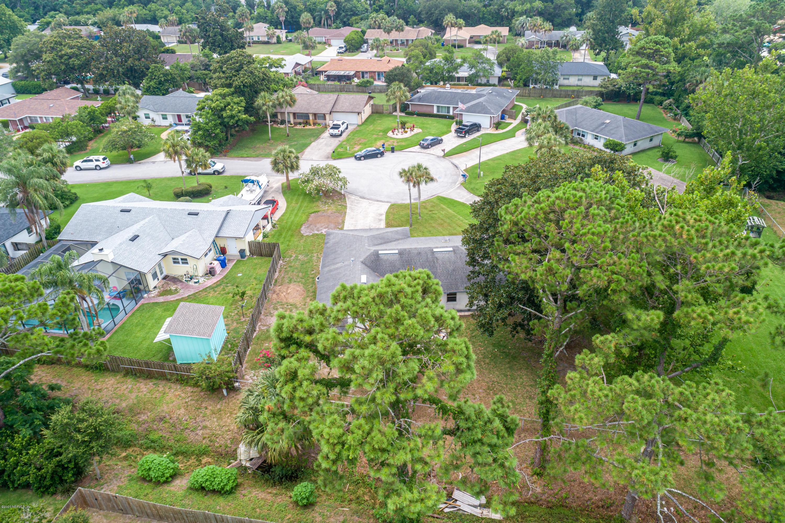 20 Amberjack Road Ponte Vedra Beach, FL 32082 - Photo 36 of 37 an aerial view of a house with a yard