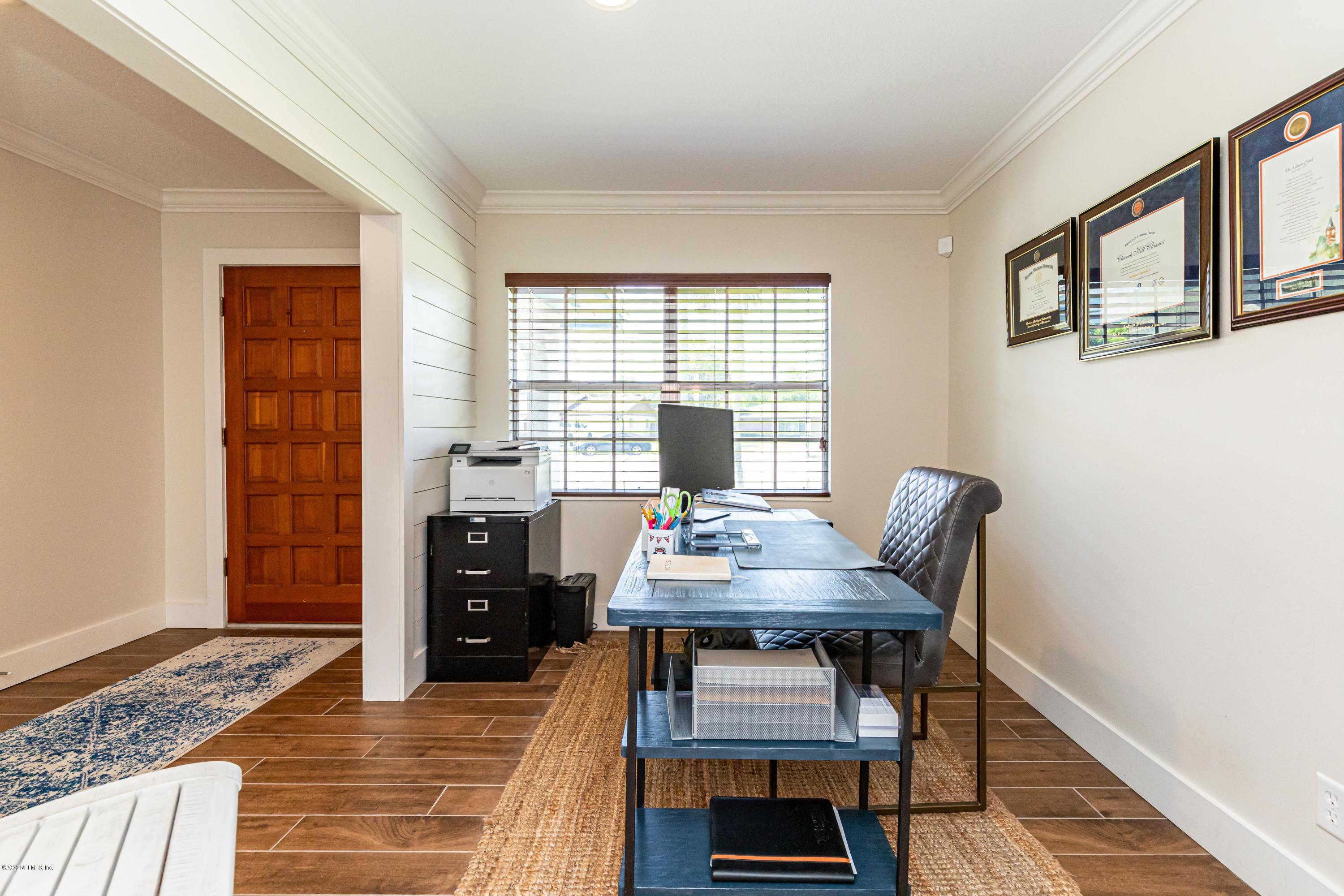 20 Amberjack Road Ponte Vedra Beach, FL 32082 - Photo 6 of 37 a workspace with furniture window and wooden floor