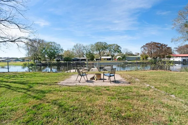 a view of a lake with outdoor space