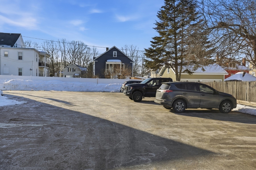 381 South Main Street, Unit 2 Haverhill, MA 01835 - Photo 16 of 18 a view of a car parked in front of a house