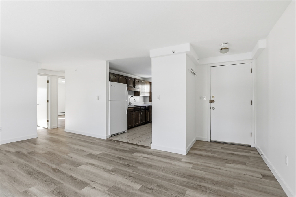 381 South Main Street, Unit 2 Haverhill, MA 01835 - Photo 5 of 18 a view of a kitchen with a sink and refrigerator
