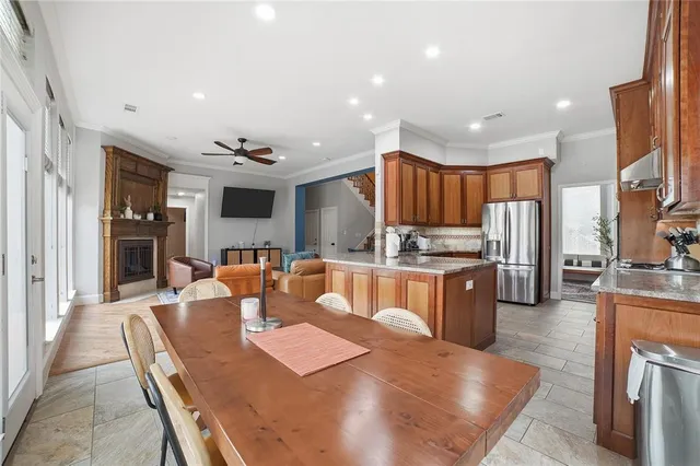 a view of staircase with furniture and a window