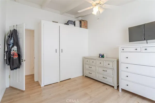 a view of a dresser with flat screen tv