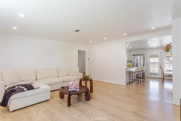 a living room with furniture and a couch