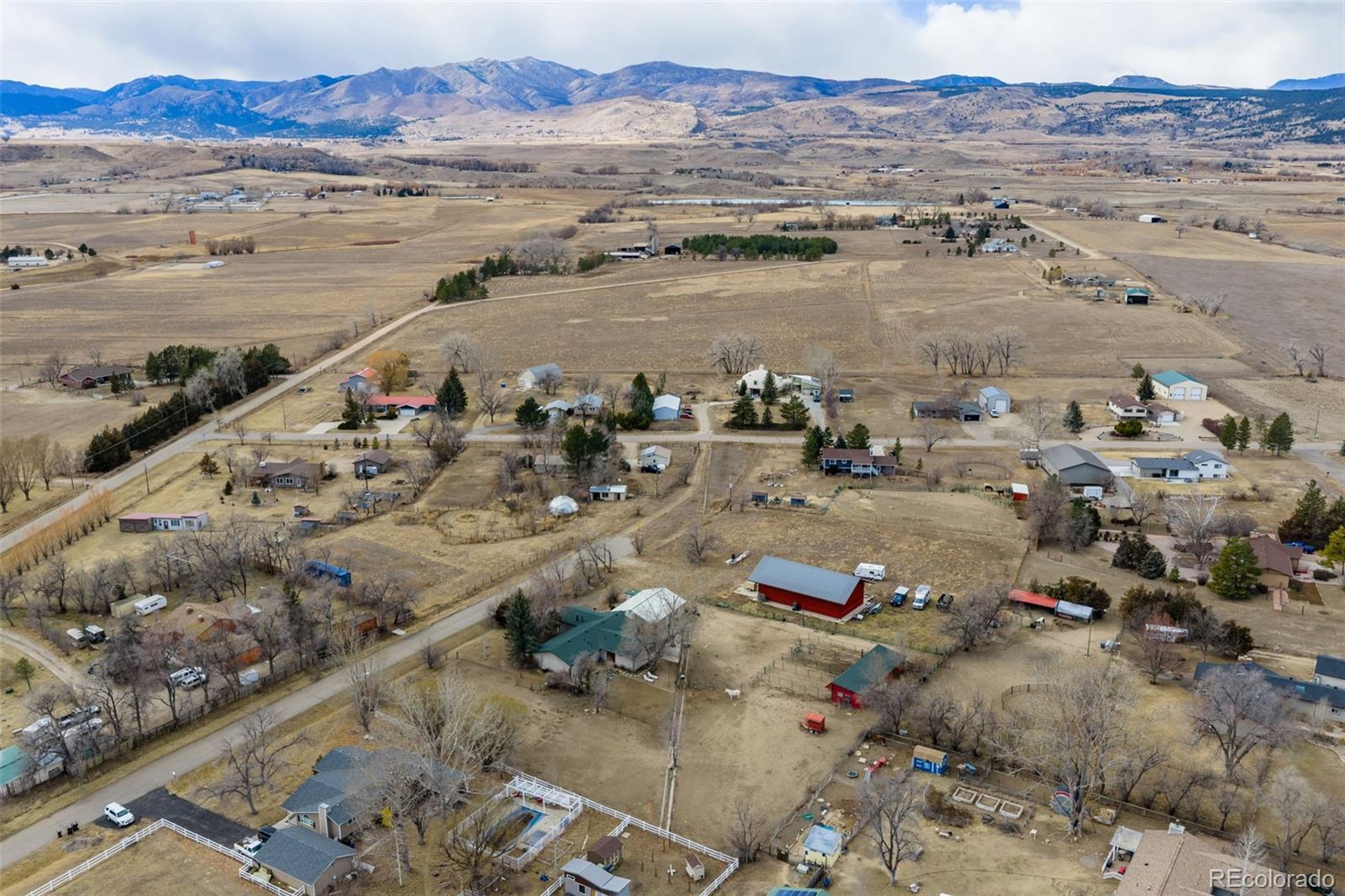 6263 Laodicea Road Longmont, CO 80503 - Photo 2 of 45 a view of lake and mountain