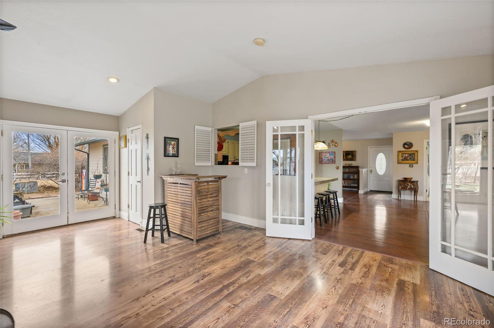 6263 Laodicea Road Longmont, CO 80503 - Photo 32 of 45 a view of a livingroom with furniture and hardwood floor