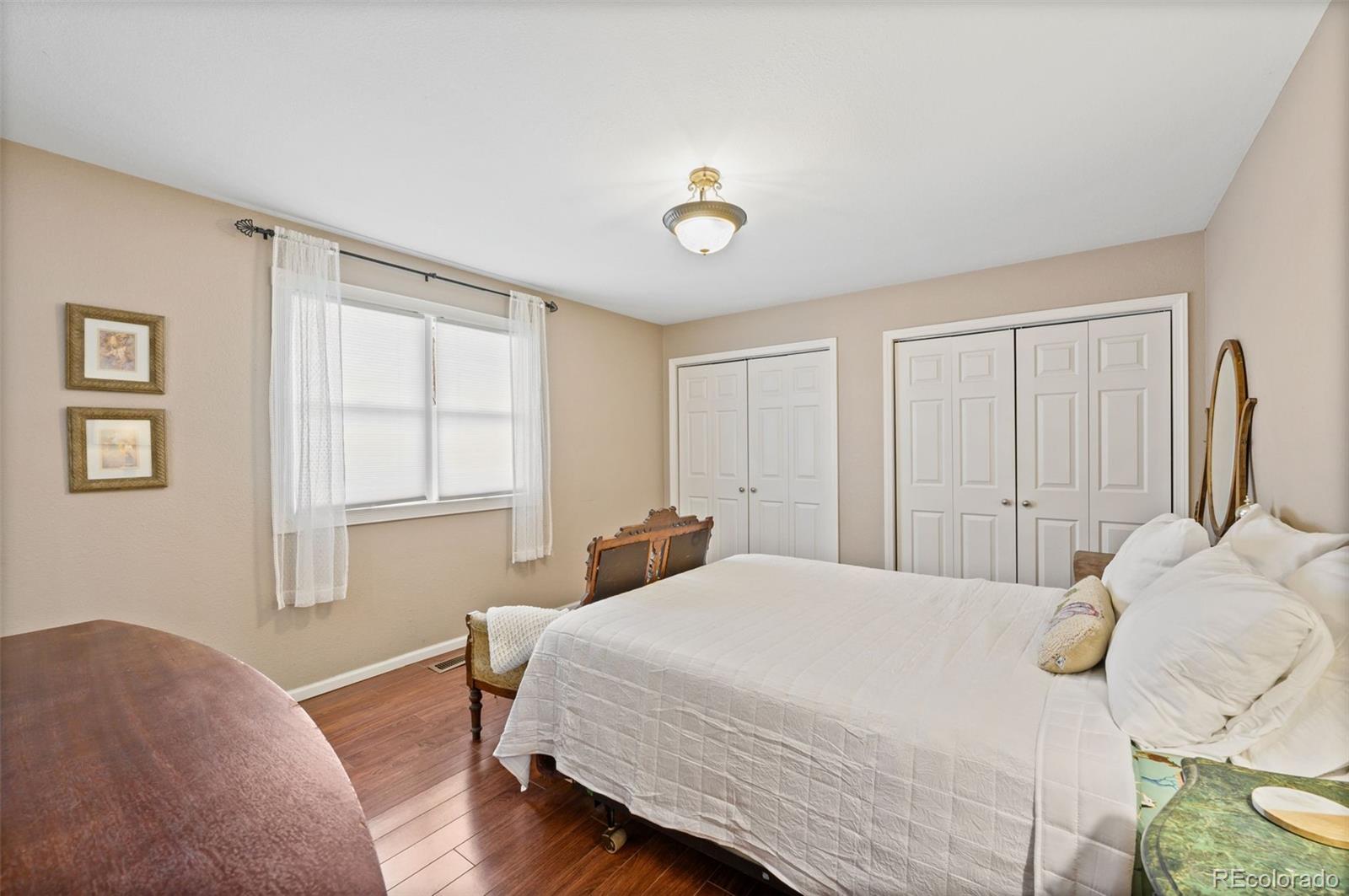 6263 Laodicea Road Longmont, CO 80503 - Photo 36 of 45 a bedroom with a bed and a window