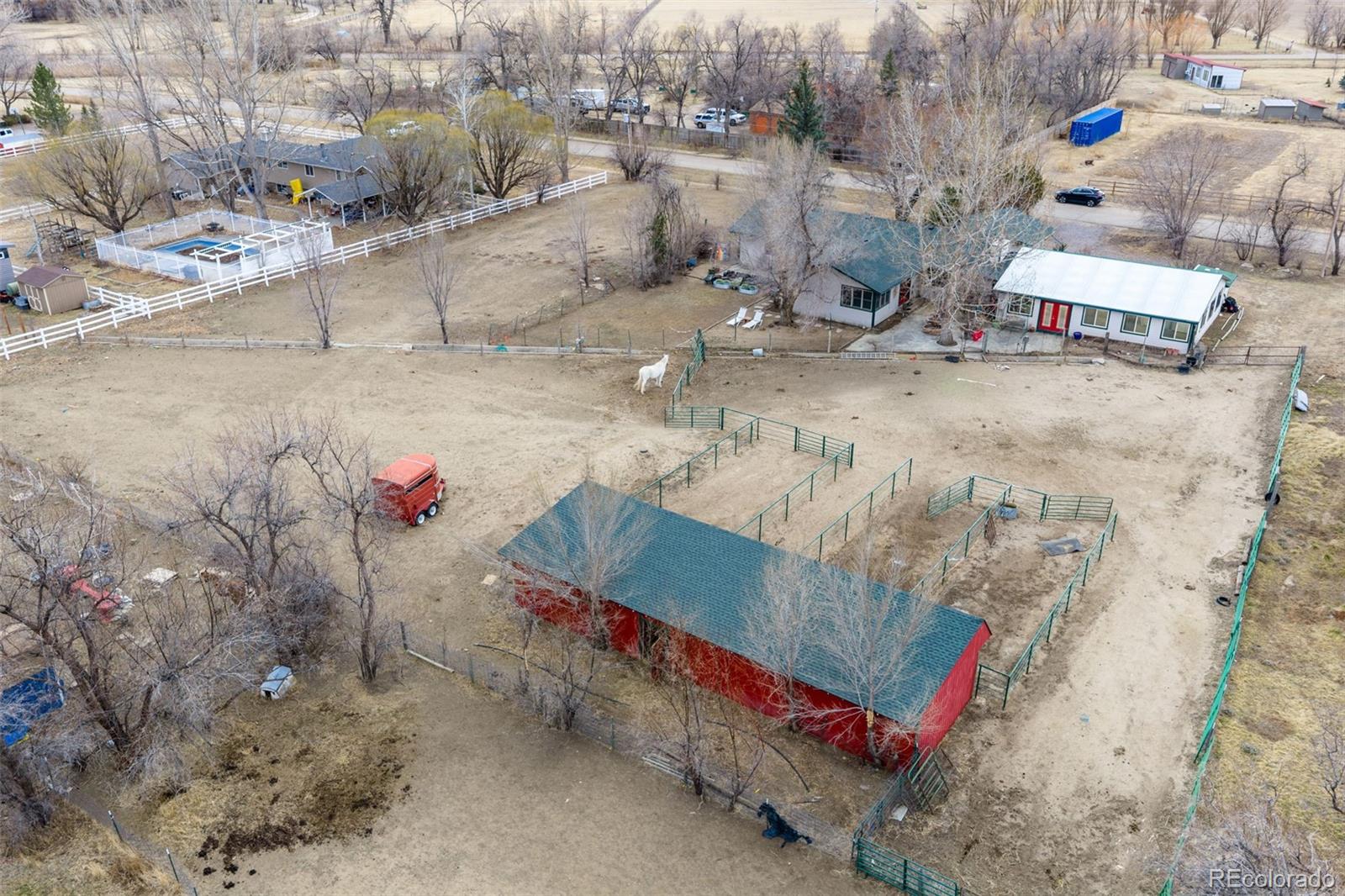 6263 Laodicea Road Longmont, CO 80503 - Photo 5 of 45 a small pool covered with snow on the side of the road
