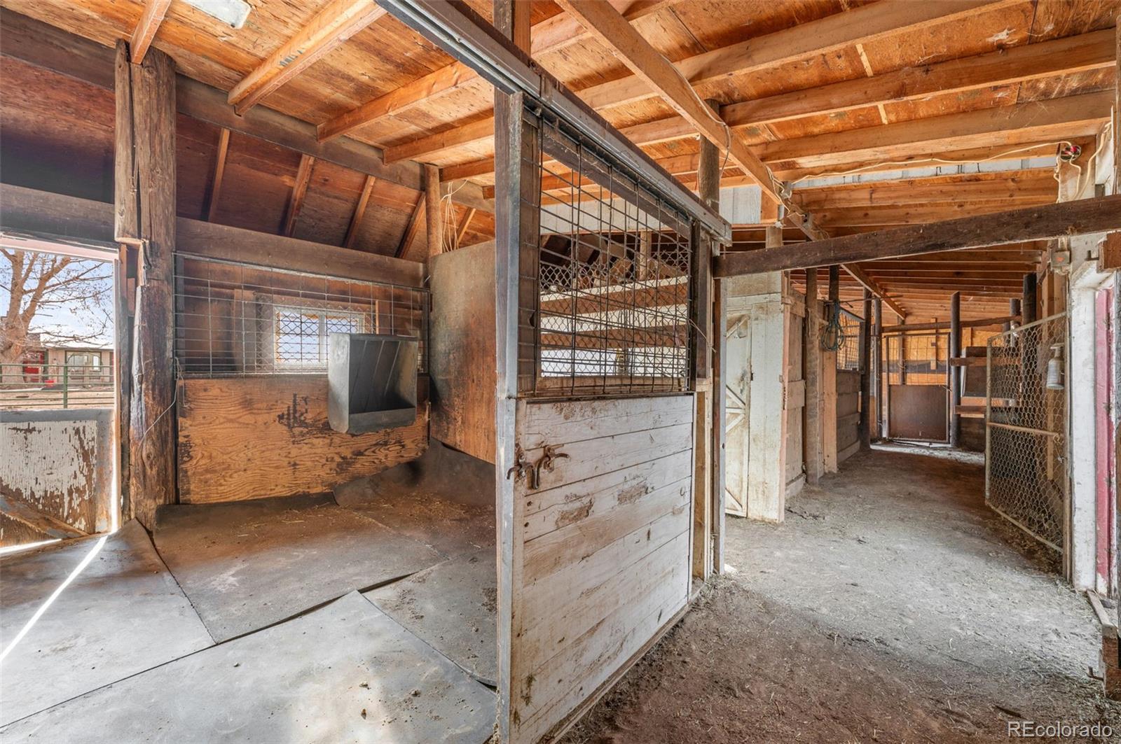 6263 Laodicea Road Longmont, CO 80503 - Photo 8 of 45 a view of an empty room with wooden floor