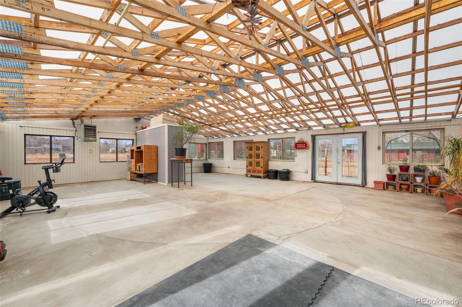6263 Laodicea Road Longmont, CO 80503 - Photo 9 of 45 a view of a big room with garage