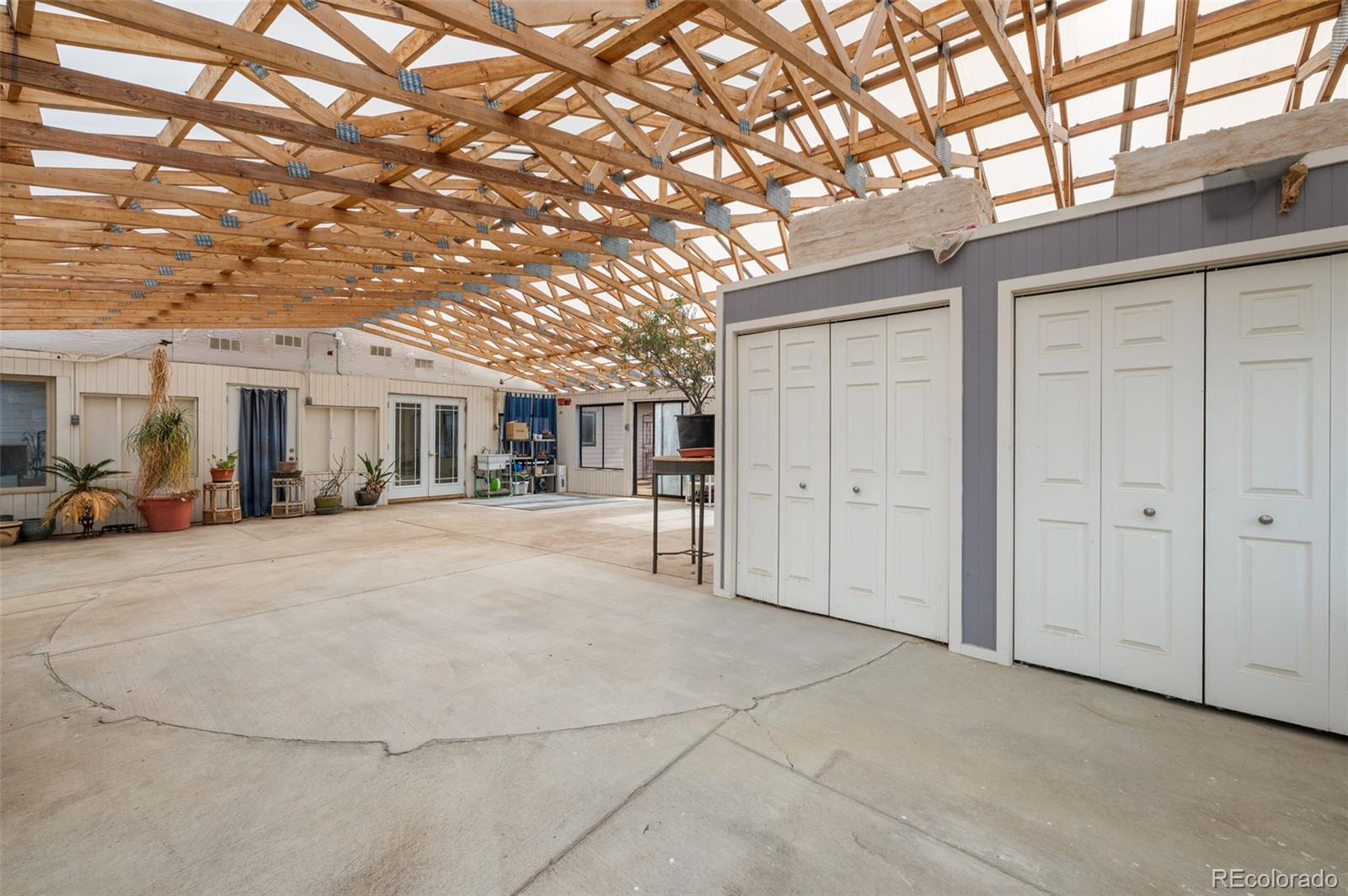 6263 Laodicea Road Longmont, CO 80503 - Photo 10 of 45 a view of a house with a large tree