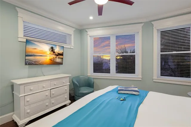 a bedroom with a bed and a table in it