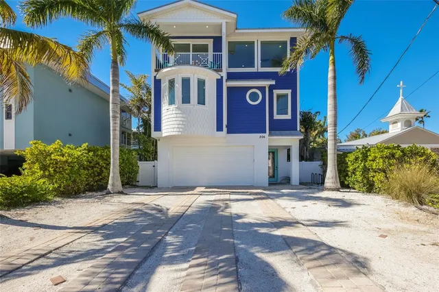 a view of a balcony with wooden floor and city view