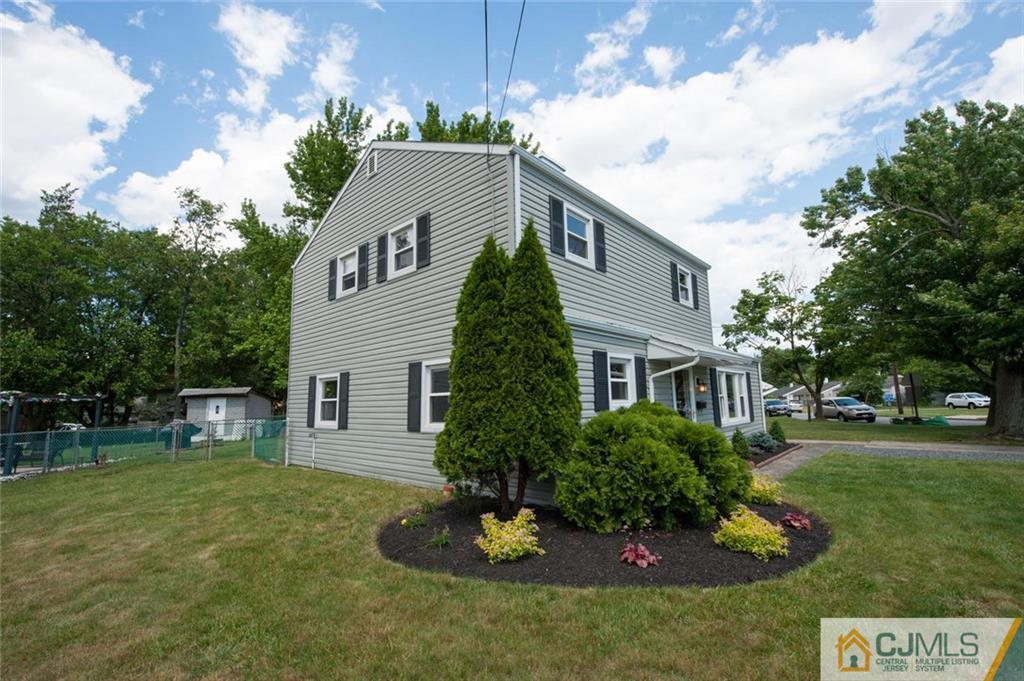 31 Raleigh Road Edison, NJ 08817 - Photo 22 of 23 a front view of a house with a yard