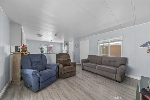 a bedroom with a bed and flat screen tv