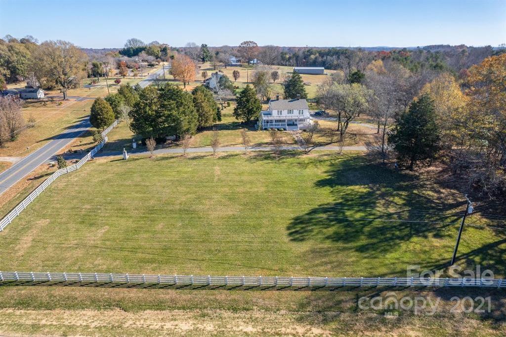 2497 Settlemyre Bridge Road Newton, NC 28658 - Photo 40 of 40 a view of a lake with a mountain