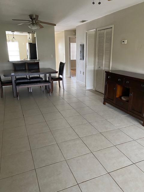 6028 Indrio Road, Unit M4 Fort Pierce, FL 34951 - Photo 3 of 10 6028 Living Dining