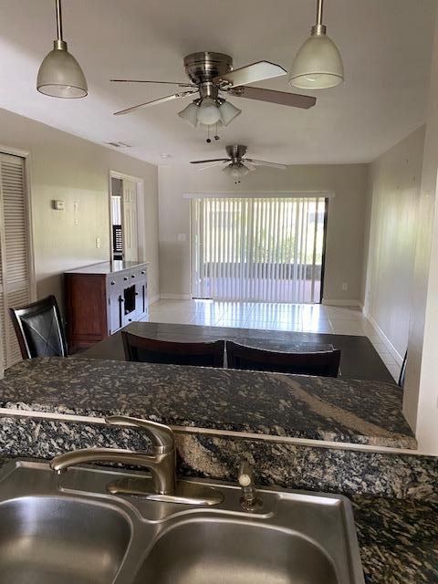 6028 Indrio Road, Unit M4 Fort Pierce, FL 34951 - Photo 4 of 10 6028 kitchen dining