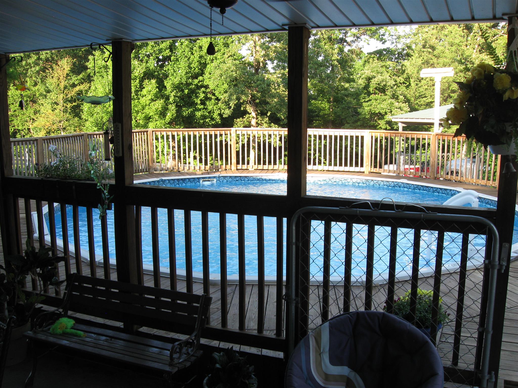 213 Black Road Dickson, TN 37055 - Photo 2 of 27 a view of a porch with a bench