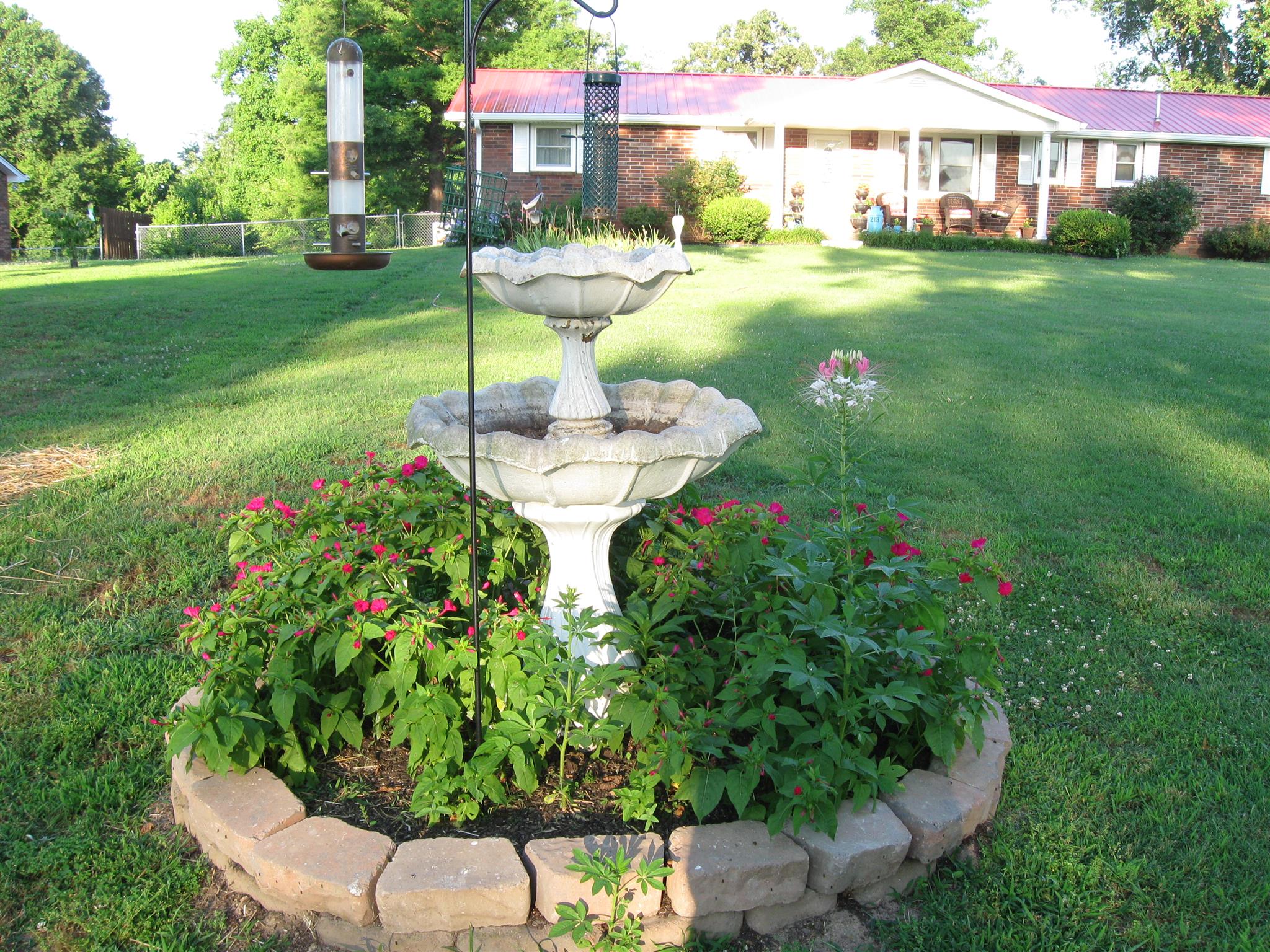 213 Black Road Dickson, TN 37055 - Photo 3 of 27 a swimming pool with barbeque oven outdoor seating and yard