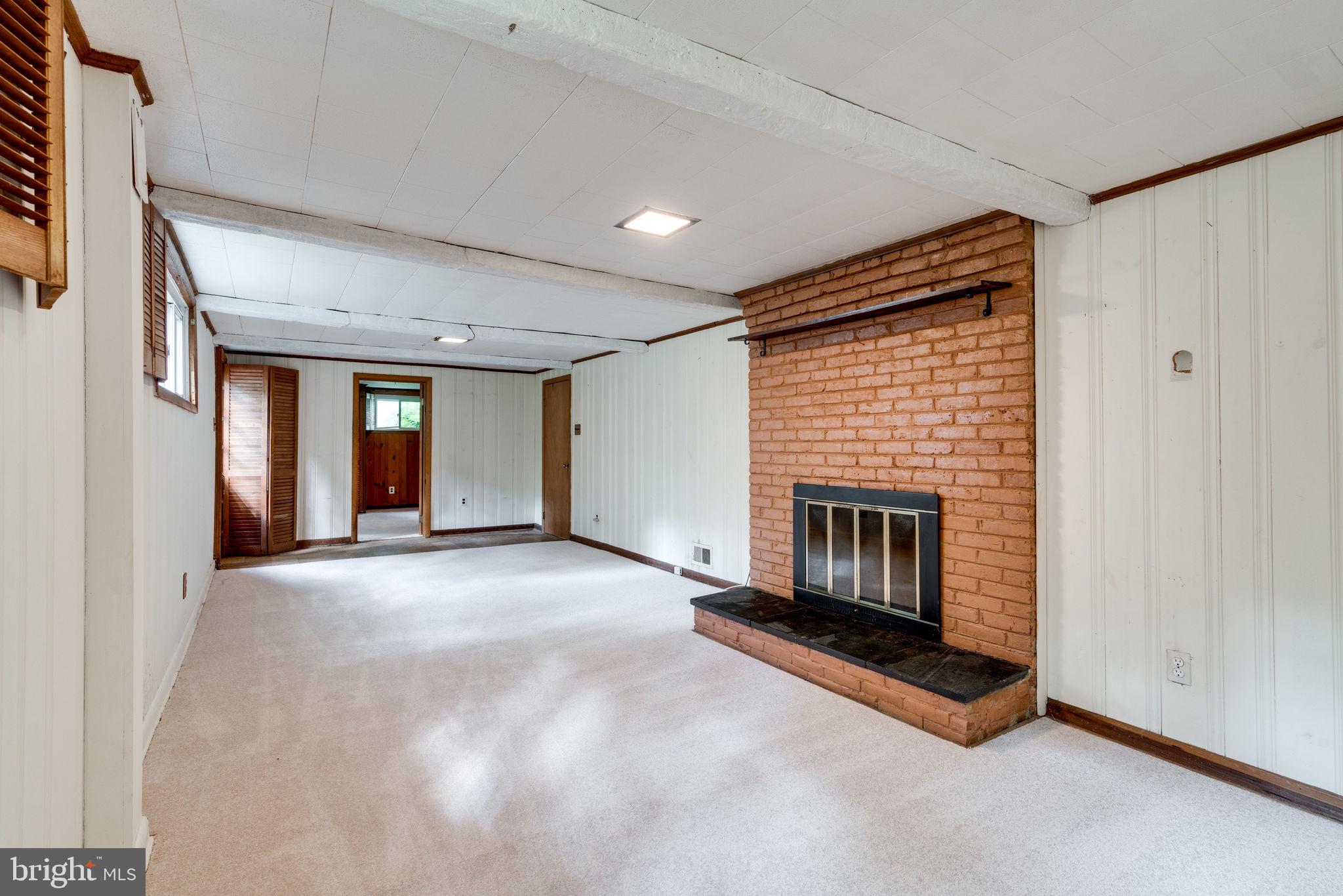 7410 Long Pine Drive Springfield, VA 22151 - Photo 24 of 53 Lower level w newly installed carpet and fplc