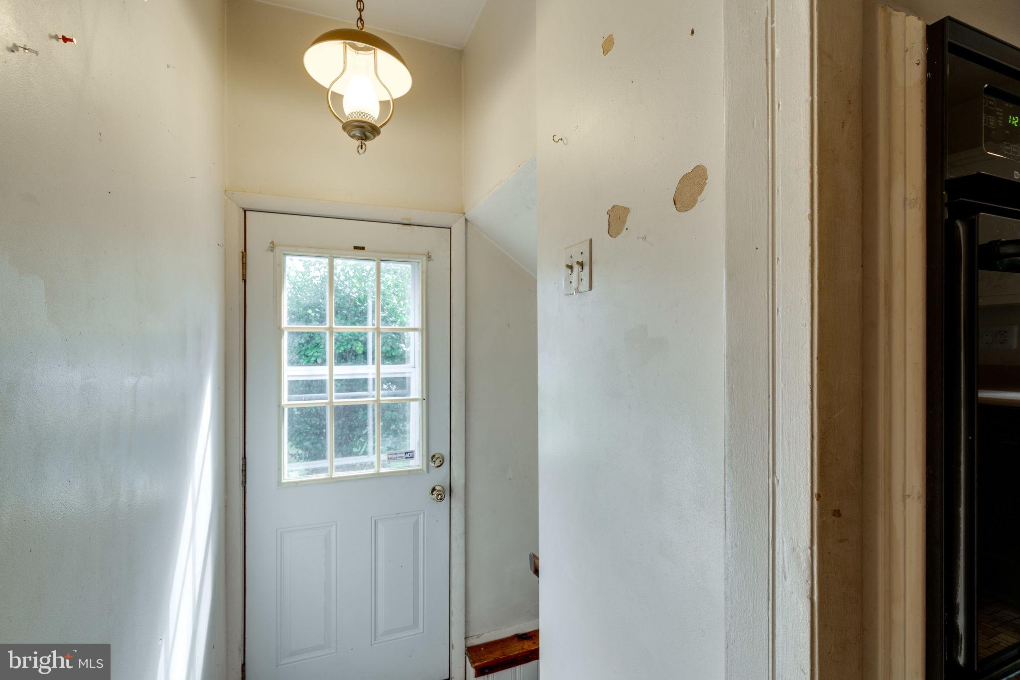 7410 Long Pine Drive Springfield, VA 22151 - Photo 25 of 53 Side entrance to kitchen and down to lower level