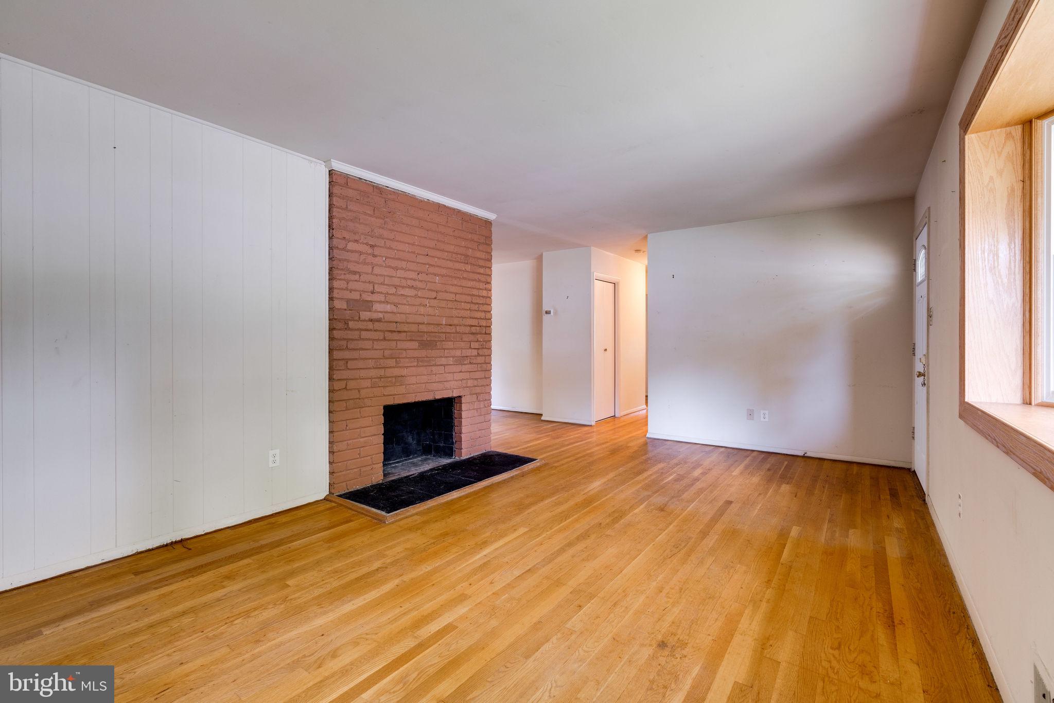 7410 Long Pine Drive Springfield, VA 22151 - Photo 10 of 53 Living room with wood burning fireplace