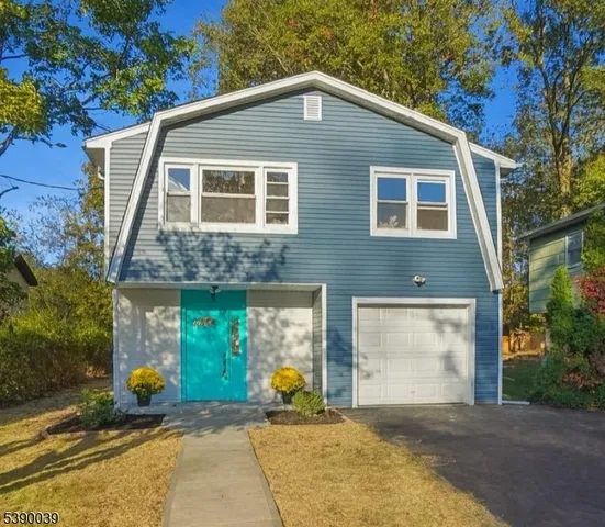 a front view of a house with patio
