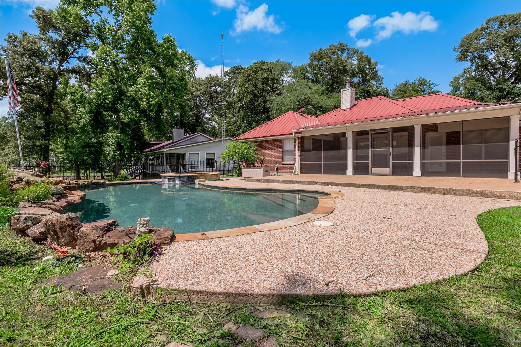 324 Red Oak Lane Trinity, TX 75862 - Photo 37 of 49 a view of a house with swimming pool and a yard