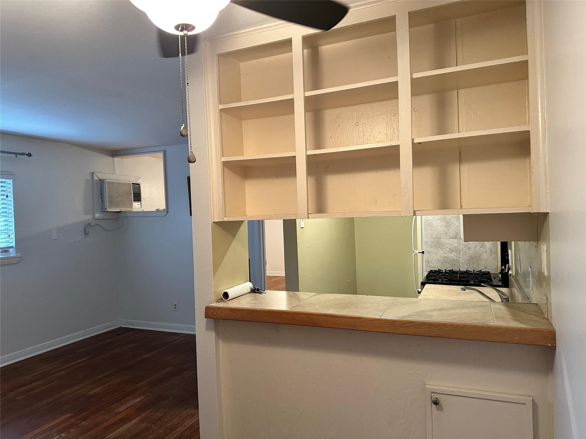 2022 Branard Street, Unit 5 Houston, TX 77098 - Photo 15 of 16 a bedroom with a bed and a window