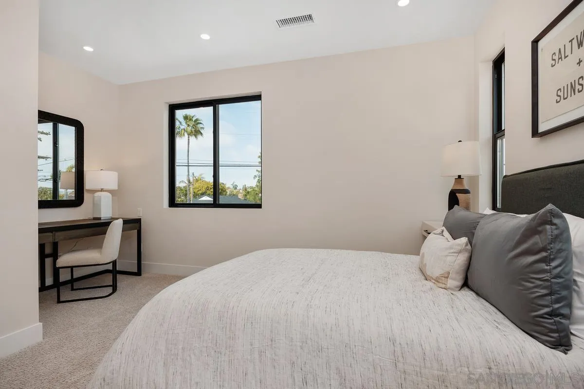 1645 Hunsaker Street Oceanside, CA 92054 - Photo 11 of 22 a bedroom with a bed and a window