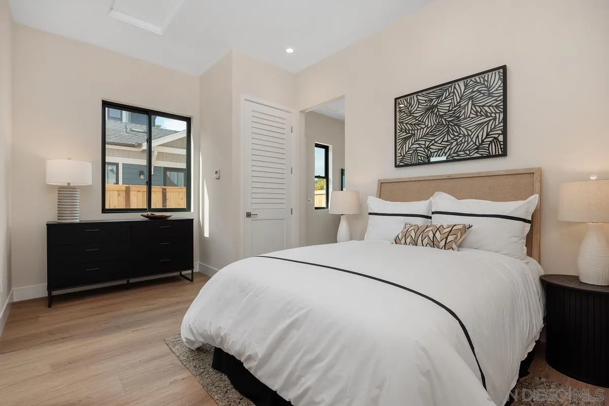 1645 Hunsaker Street Oceanside, CA 92054 - Photo 17 of 22 a bedroom with a bed and a window