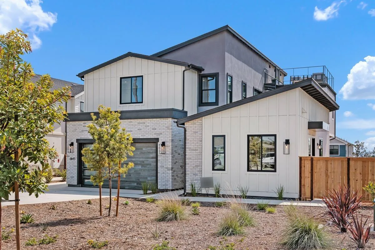 1645 Hunsaker Street Oceanside, CA 92054 - Photo 22 of 22 a view of a house with a yard